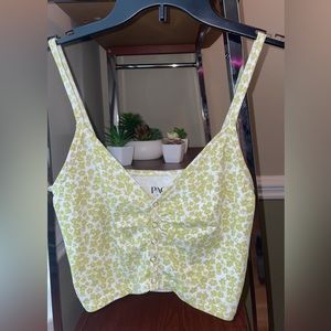 PacCares Eco Rowdy Snap Tank Top, Green and White Flower Design.